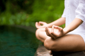 Person meditating.